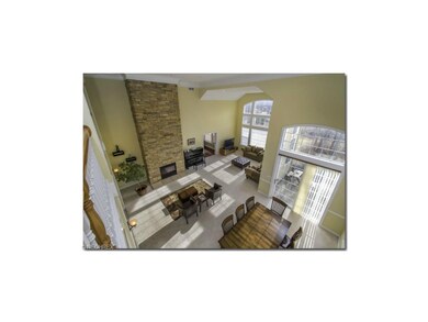 Fabulous Two Story Great Room with Stone Fireplace