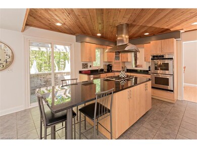 Another view of kitchen with slider to beautiful o