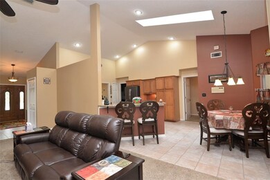 Open layout from family room, dinette area & kitch