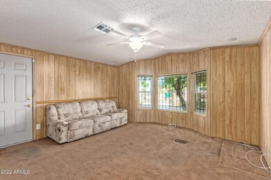 Living room, door to driveway