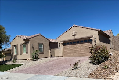 Mediterranean / spanish house featuring driveway,