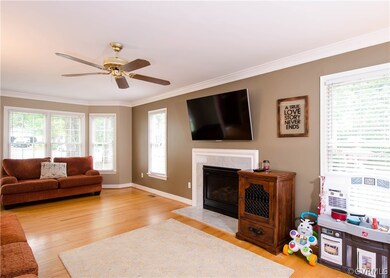 The family room is open and bright with handsome d