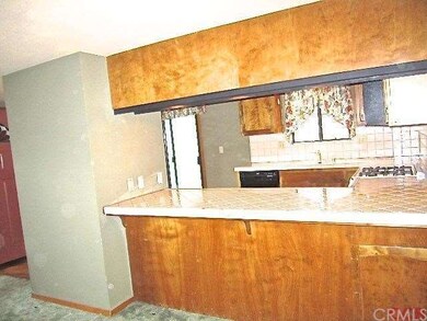 Kitchen opens to dining area and living room - pul