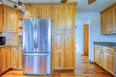 This exquisitely updated kitchen features plenty o