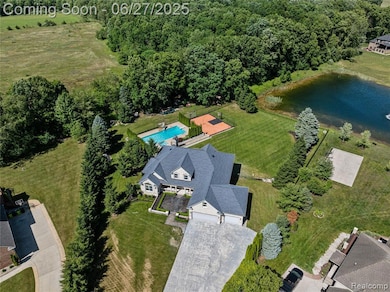 Pool, sport court and a pond