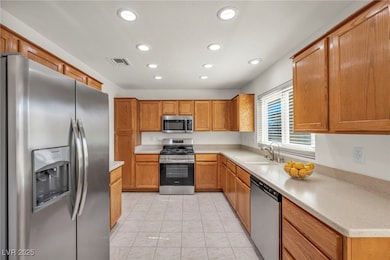 Kitchen featuring visible vents, recessed lighting