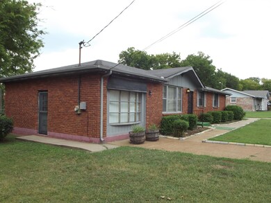 view of side door to enter man cave.