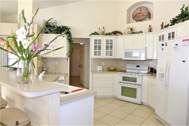 Bright & Open Kitchen with white shaker cabinets,