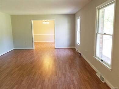 Huge living room opens to the dining room