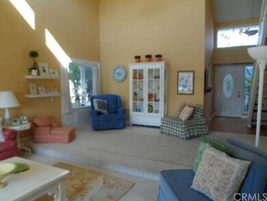 Dining area with bay window and view of park. 
Thi
