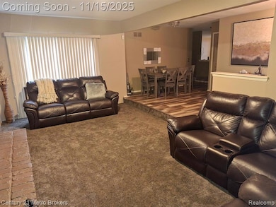 Living room featuring carpet flooring