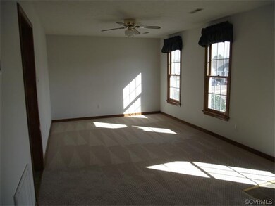 Spacious Living Room with new carpet and ceiling f