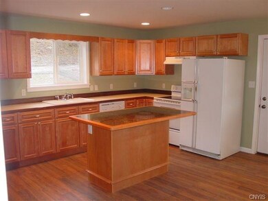 Full wall kitchen with island.