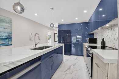 5753 Spindle Palm Ct unit C, Delray Beach, FL 33484 - photo 2