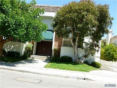 Front of cute building, and driveway going to park
