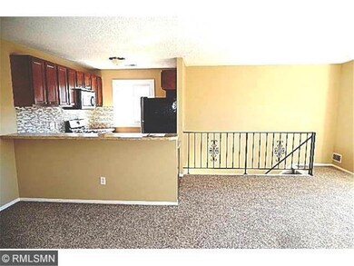 Large open living area with new carpet, fresh pain