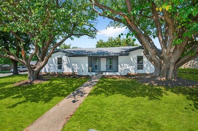 Single story home featuring a front yard