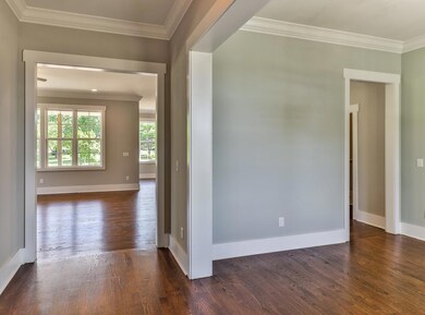 Sand and Finish hardwoods from the Almish, to the right is the dining room.