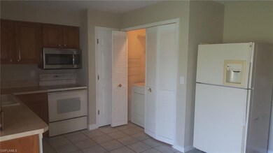 Kitchen With Laundry Area