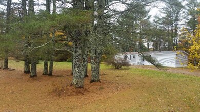 Home has large circular driveway...
