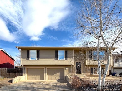 406 Sundance Cir, Dacono, CO 80514 - photo 2