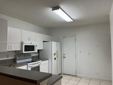 7665 Tamarac Island Cir, Tamarac, FL 33321 - photo 5