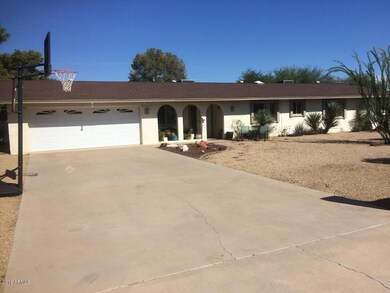 2 car garage w/cabinets & storage room