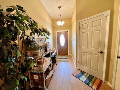 Looking at the front Door, Garage Door and Coat Cl