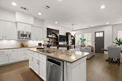Kitchen featuring stainless steel appliances, a s