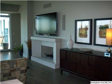 Custom limestone surround fireplace with contempor