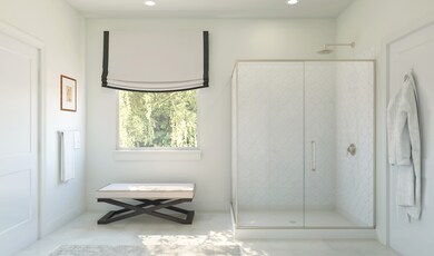 Primary bath with glass shower enclosure