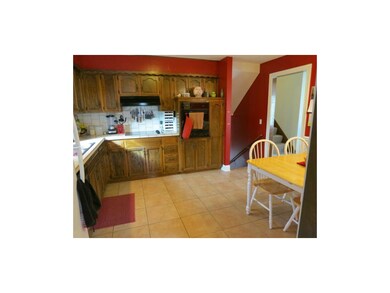 Located off the dining room is the charming eat-in