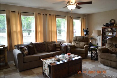 Living room with full wall of windows for plenty o