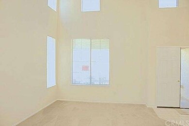 View of the living room. It features 2-story high 