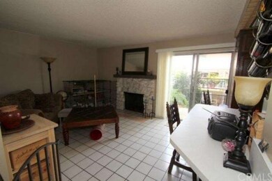 Separate family room in the back with glass slidin