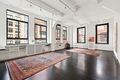 348 W 38th St unit 9-E, New York, NY 10018 - photo 2
