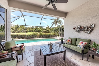 View of patio / terrace with outdoor lounge area, ceiling fan, an outdoor pool, and a lanai