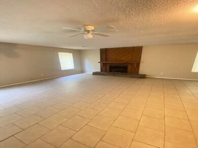 Unfurnished living room with light tile patterned 