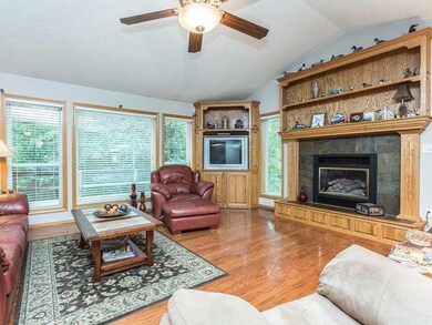 Living Room. Bright and cheery with a wall of windows letting the light shine in