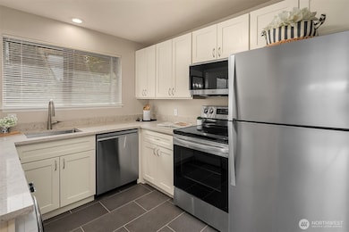Remodeled kitchen with new appliances.