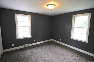 Master Bedroom with two windows and plenty of outl