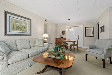 Living room looking into dining area.