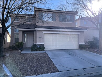 Traditional-style house featuring stucco siding, a
