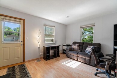 Front door and living room in front unit