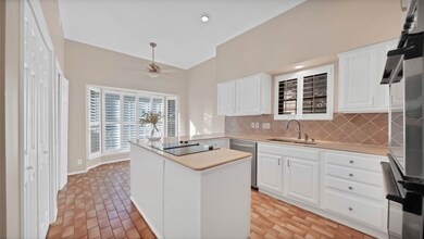 Kitchen features high-ceilings, a huge pantry and