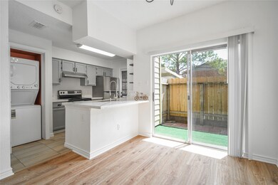 A cozy kitchen with an island offering a functiona