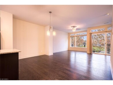 Open concept dining / living room areas with balco