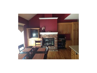 Wall of built ins includes desk/workspace