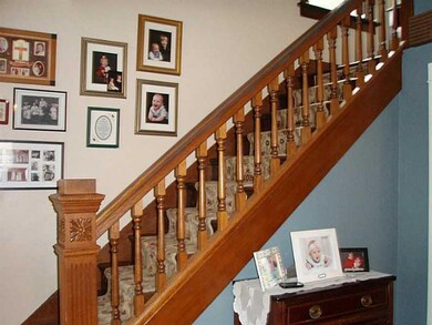Entry/Foyer. Original Wood Banister and Railings e