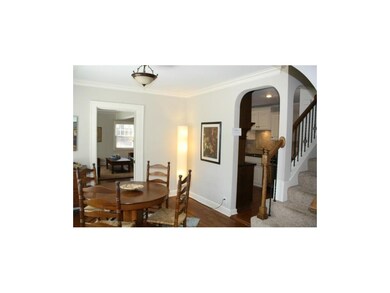 Dining room leads into family room and kitchen